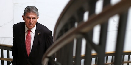 Sen. Joe Manchin leaves a closed hearing of Senate Armed Services Committee on Sept. 14, 2021, on Capitol Hill in Washington, D.C.  