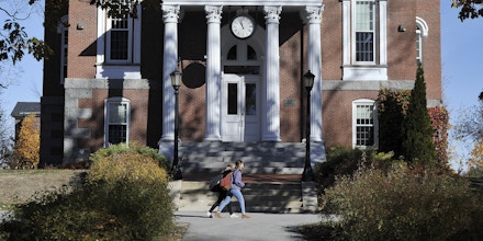 Students walk past Hathorn Hall in the Bates College campus in Lewiston, Maine, on Nov. 7, 2016. 