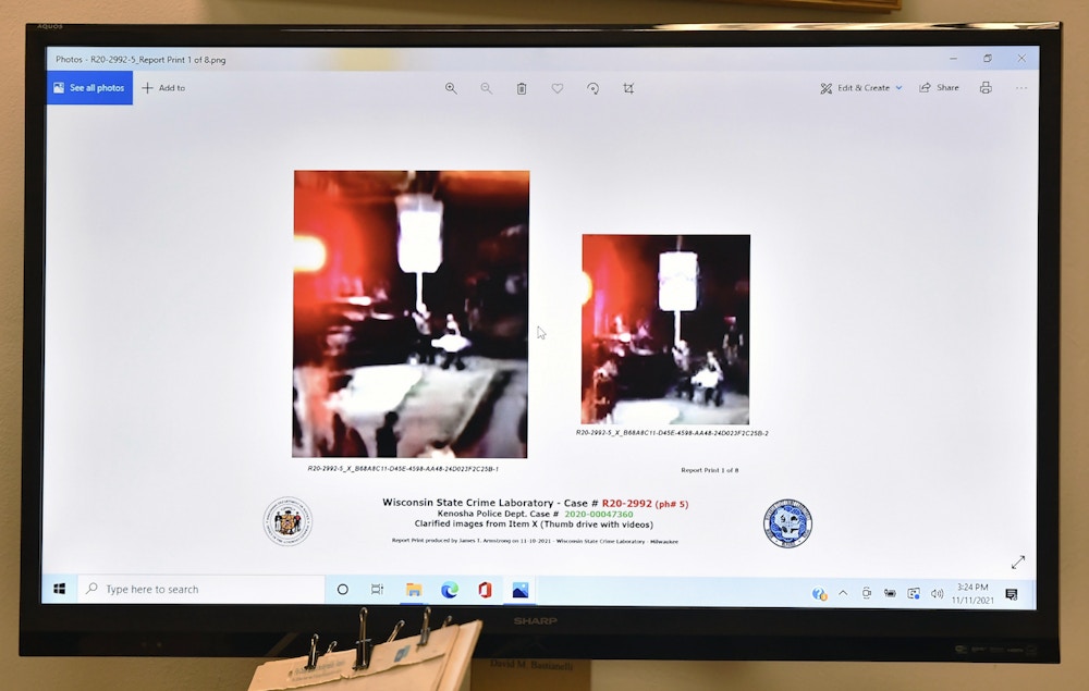 Images that have been enlarged through interpolation are displayed on a screen during Kyle Rittenhouse's trial at the Kenosha County Courthouse in Kenosha, Wis., on Thursday, Nov. 11, 2021. An argument has ensued about the potential for inaccuracies in images that have been enlarged through different methods. (AP Photo/Kenosha News, Sean Krajacic)