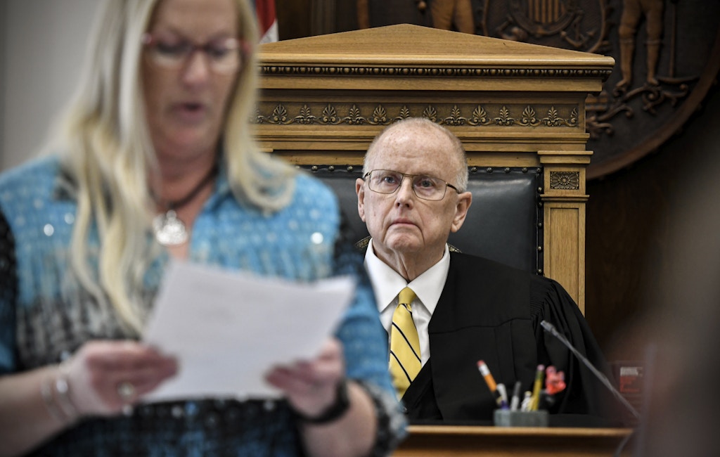 KENOSHA, WISCONSIN - NOVEMBER 19: Judge Bruce Schroeder, right, listens as the verdicts are ready by Judicial Assistant Tami Mielcarek in Kyle Rittenhouse's trial at the Kenosha County Courthouse on November 19, 2021 in Kenosha, Wisconsin. Rittenhouse was found not guilty of all charges in the shooting of three demonstrators, killing two of them, during a night of unrest that erupted in Kenosha after a police officer shot Jacob Blake seven times in the back while being arrested in August 2020. Rittenhouse, from Antioch, Illinois, claimed self-defense who at the time of the shooting was armed with an assault rifle.  (Photo by Sean Krajacic - Pool/Getty Images)