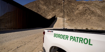 A Border Patrol vehicle in front of a section of the U.S-Mexico border fence near Ocotillo, Calif., on Sept. 13, 2021.