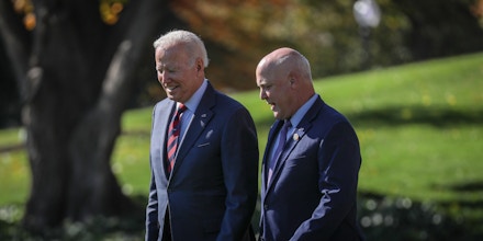 President Joe Biden, left, walks to Marine One with Mitch Landrieu, former mayor of New Orleans, right, before departing from the South Lawn of the White House in Washington, D.C., on Nov. 16, 2021.