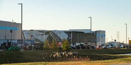A collapsed roof at an Amazon warehouse following a tornado in Edwardsville, Illinois, U.S., on Sunday, Dec. 12, 2021. Tornadoes ripped across several U.S. states late Friday, killing at least six at a Amazon warehouse that was partially flattened in Illinois. Photographer: Liam Kennedy/Bloomberg via Getty Images