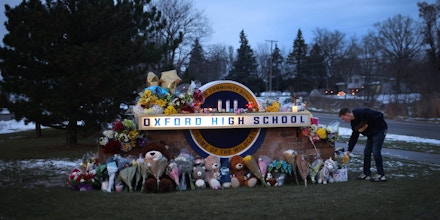 A makeshift memorial to the four students killed in a school shooting is seen outside Oxford High School on Dec. 1, 2021, in Oxford, Mich.