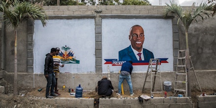 Local artists paint murals in tribute to slain President Jovenel Moïse in Cap-Haïtien, Haiti, on July 22, 2021.
