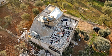 An aerial view shows destruction following an overnight raid by U.S. special operations forces in Idlib, Syria, on Feb. 3, 2021.