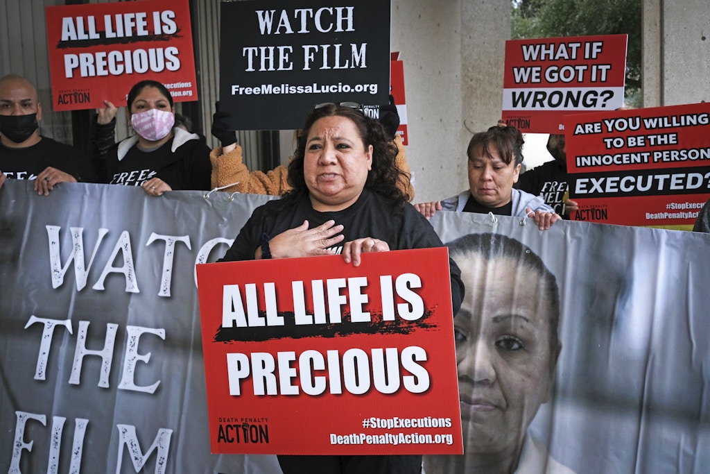 Sonya Valencia Alvarez, sister of Melissa Lucio, pleas to the public while surrounded by family and friends on the steps of the Cameron County Courthouse Administrative entrance in Brownsville, Texas, on Monday, Feb. 7, 2022, that her sister is innocent and was wrongfully sentenced to death for the murder of Lucio's 2-year-old daughter, Mariah. A 2008 conviction by a Cameron County, Texas jury found Lucio guilty of capital murder. (Miguel Roberts/The Brownsville Herald via AP)