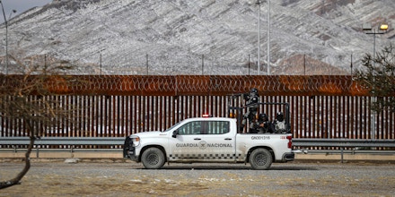 National Guard agents patrol the border wall to prevent migrants from crossing into the United States, after a winter storm in Ciudad Juarez, Chihuahua state, Mexico on February 3, 2022. (Photo by HERIKA MARTINEZ / AFP) (Photo by HERIKA MARTINEZ/AFP via Getty Images)