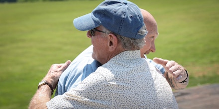 Claude Garrett embraces his friend Denny Griswold after being released from prison in Nashville, Tenn., on May 10, 2022.