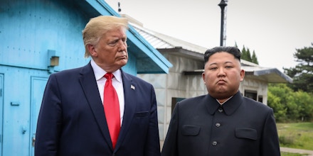 PANMUNJOM, SOUTH KOREA - JUNE 30 (SOUTH KOREA OUT): A handout photo provided by Dong-A Ilbo of North Korean leader Kim Jong Un and U.S. President Donald Trump inside the demilitarized zone (DMZ) separating the South and North Korea on June 30, 2019 in Panmunjom, South Korea. U.S. President Donald Trump and North Korean leader Kim Jong-un briefly met at the Korean demilitarized zone (DMZ) on Sunday, with an intention to revitalize stalled nuclear talks and demonstrate the friendship between both countries. The encounter was the third time Trump and Kim have gotten together in person as both leaders have said they are committed to the 