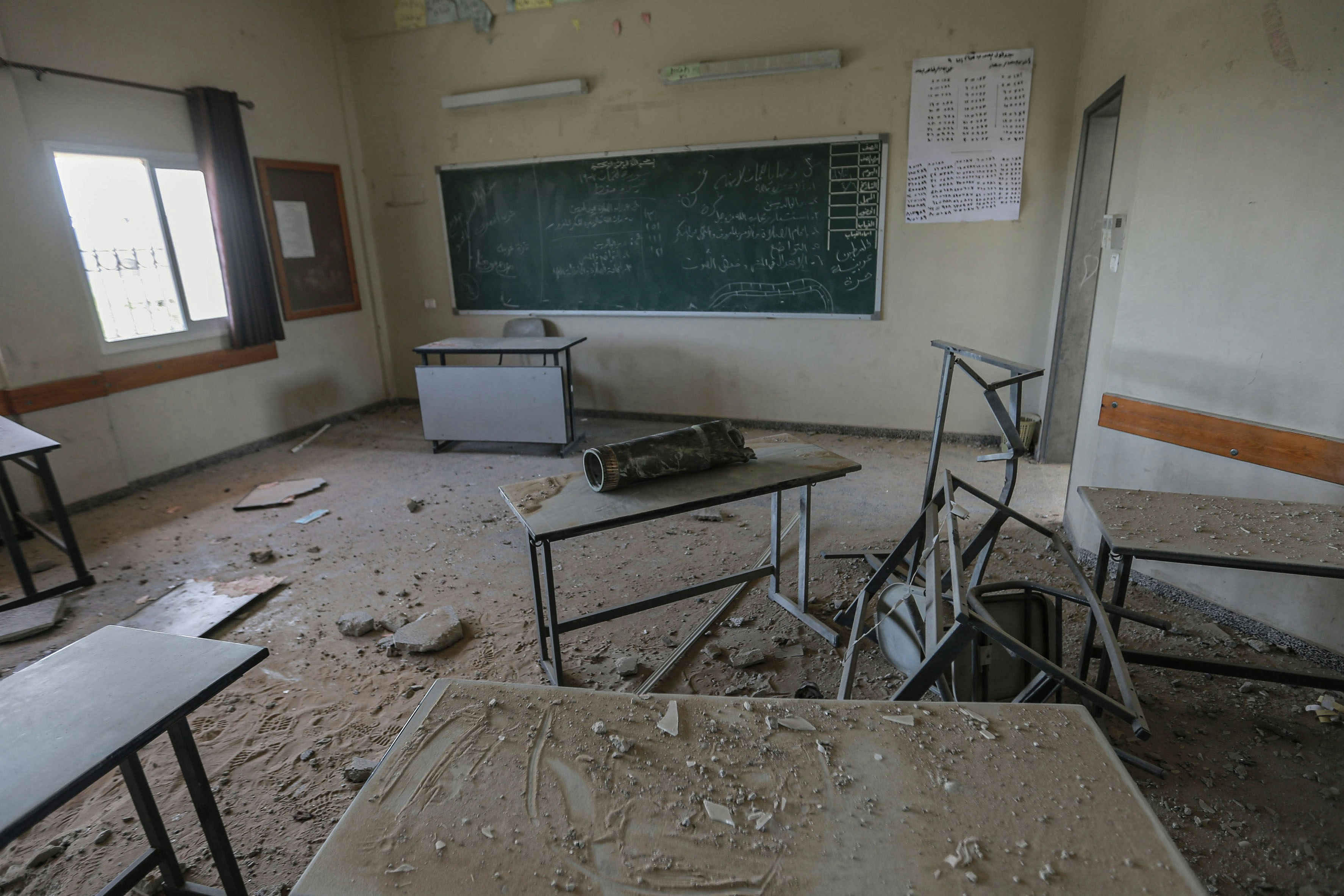 30 May 2021, Palestinian Territories, Gaza City: A general view of an exploded Israeli shell inside a damaged classroom of a school that was hit during the recent Israeli airstrikes on the Zeitoun neighbourhood in Gaza City. Israel and the Palestinian Hamas Islamist movement have so far been keeping to an agreed ceasefire that went into effect on 21 May after 11 days of deadly confrontations. Photo: Mohammed Talatene/dpa (Photo by Mohammed Talatene/picture alliance via Getty Images)