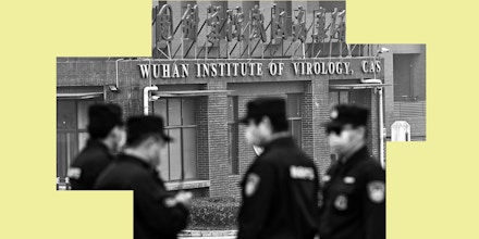 Security personnel stand guard outside the Wuhan Institute of Virology in Wuhan as members of the World Health Organization (WHO) team investigating the origins of the COVID-19 coronavirus make a visit to the institute in Wuhan in China's central Hubei province on February 3, 2021. (Photo by Hector RETAMAL / AFP) (Photo by HECTOR RETAMAL/AFP via Getty Images)