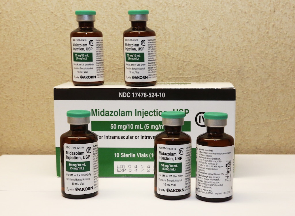 This Friday, July 25, 2014 photo shows bottles of midazolam at a hospital pharmacy in Oklahoma City. Midazolam is the common thread in three recent lengthly executions, in Oklahoma, Ohio and Arizona. (AP Photo/Sue Ogrocki)