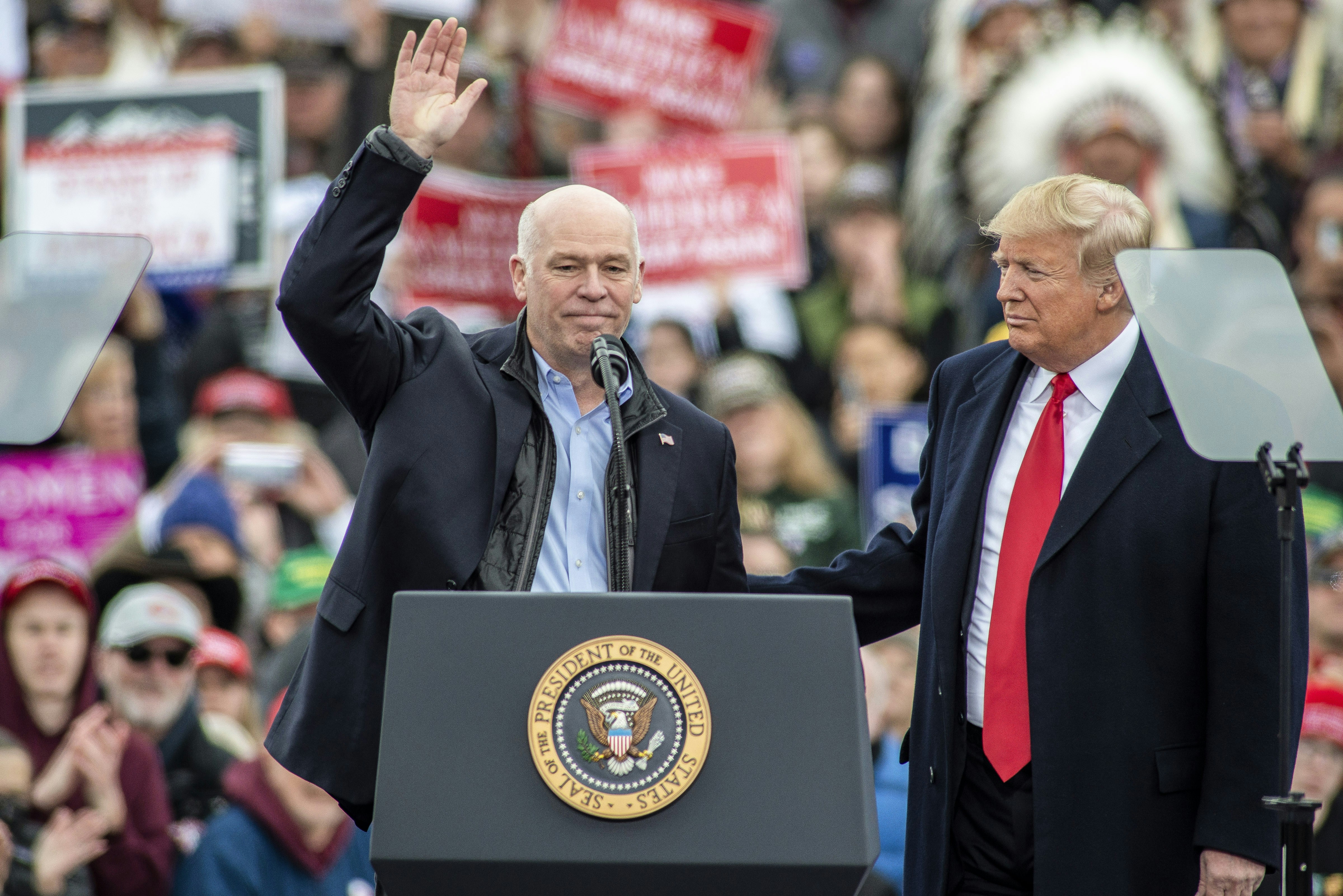 BELGRADE, MT - NOVEMBER 03: Rep. Greg Gianforte (R-MT) joins President Donald Trump at a "Make America Great Again" rally at the Bozeman Yellowstone International Airport on November 3, 2018 in Belgrade, Montana. (Photo by William Campbell/Corbis via Getty Images)