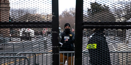 WASHINGTON, DC - JANUARY 17: Members of the Secret Service guard the expanded protective perimeter around the White House on January 17, 2021 in Washington, DC. As a result of last week's riot at the U.S. Capitol, increased security measures have been put in place, including 25,000 National Guard soldiers, ahead of the inauguration of Joe Biden as the 46th U.S. President. (Photo by Sarah Silbiger/Getty Images)