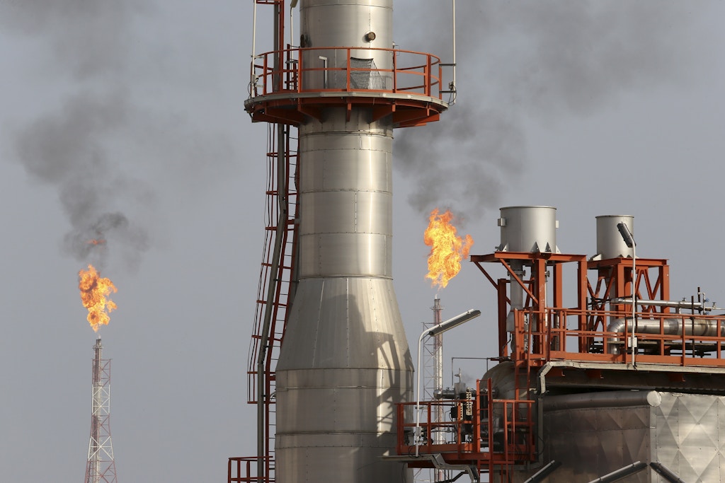 FILE - This March 16, 2019 file photo, shows a natural gas refinery at the South Pars gas field constructed by Revolutionary Guard-affiliated company, Khatam al-Anbia, the largest Iranian contractor of government construction projects, on the northern coast of the Persian Gulf, in Asaluyeh, Iran. On Monday, April 8, 2019, the Trump administration designated Iran’s Revolutionary Guard a “foreign terrorist organization” in an unprecedented move against a national armed force. (AP Photo/Vahid Salemi, File)