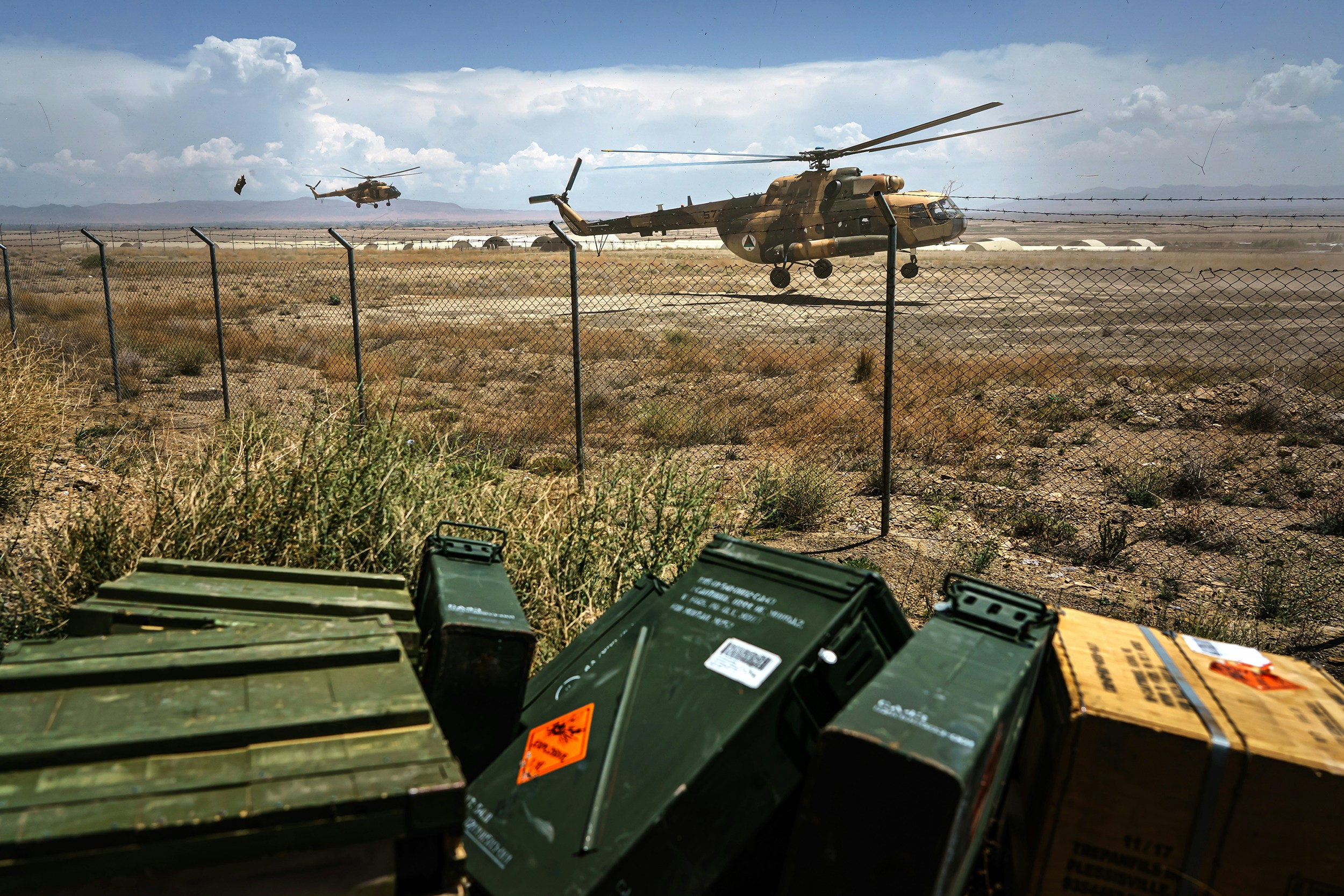 An Afghan Mi-17 lands during a resupply mission to an outpost in Ghazni Province, Afghanistan, Sunday, May 9, 2021. The Afghan Air Force, which the U.S. and its partners has nurtured to the tune of $8.5 billion since 2010, is now the governmentÕs spearhead in its fight against the Taliban. Since May 1, the original deadline for the U.S. withdrawal, the Taliban have overpowered government troops to take at least 23 districts to date, according to local media outlets. That has further denied Afghan security forces the use of roads, meaning all logistical support to the thousands of outposts and checkpoints Ñ including re-supplies of ammunition and food, medical evacuations or personnel rotation Ñ must be done by air. (MARCUS YAM / LOS ANGELES TIMES)