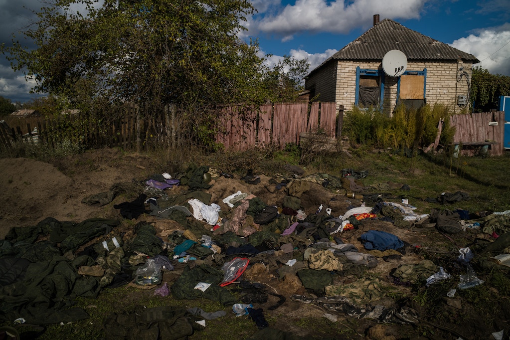 Remains of Russian uniforms in the destroyed village of Shandriholove near Liman, Ukraine, October 3, 2022.
