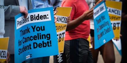 WASHINGTON, DC - AUGUST 25: Student loan debt activists rally outside the White House a day after President Biden announced a plan that would cancel $10,000 in student loan debt for those making less than $125,000 a year in Washington, DC, on August 25, 2022. (Photo by Craig Hudson for The Washington Post via Getty Images)