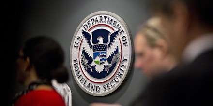 The U.S. Department of Homeland Security seal hangs on a wall at the agency headquarters in Washington, D.C., July 6, 2018.
