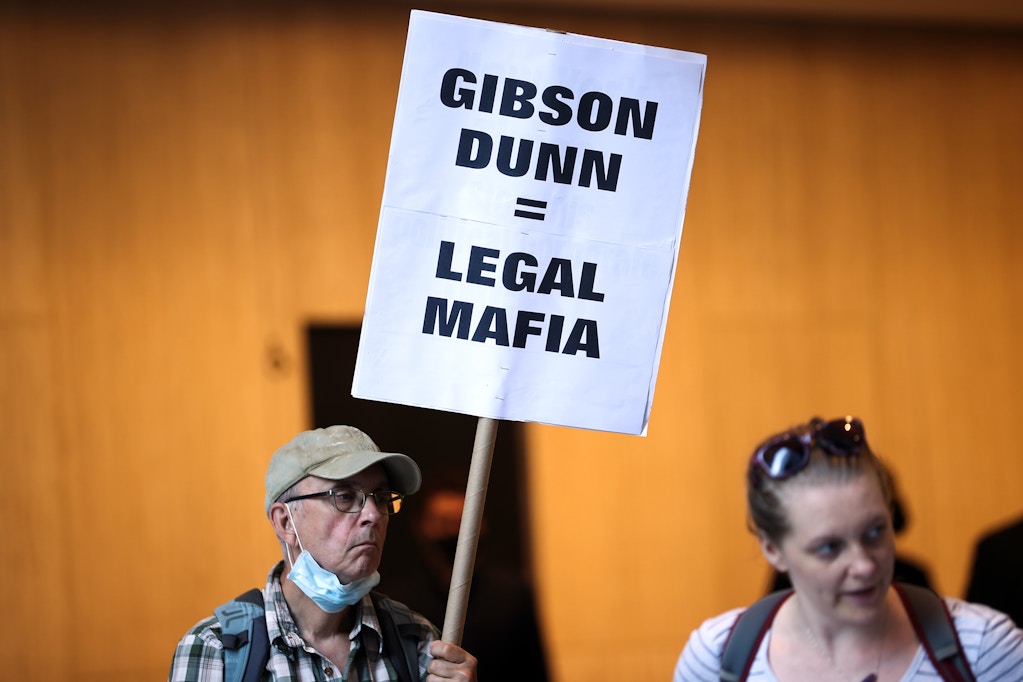 Climate activists are gathered outside Gibson Dunn office to protest against the Chevron Corp, New York City, June 10, 2021.