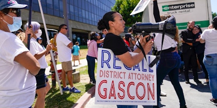 Supporters of a campaign to recall Los Angeles County District Attorney George Gascón gather to view a truck full of petitions outside the Los Angeles County Registrar of Voters, on July 6, 2022, in Norwalk, Calif. 