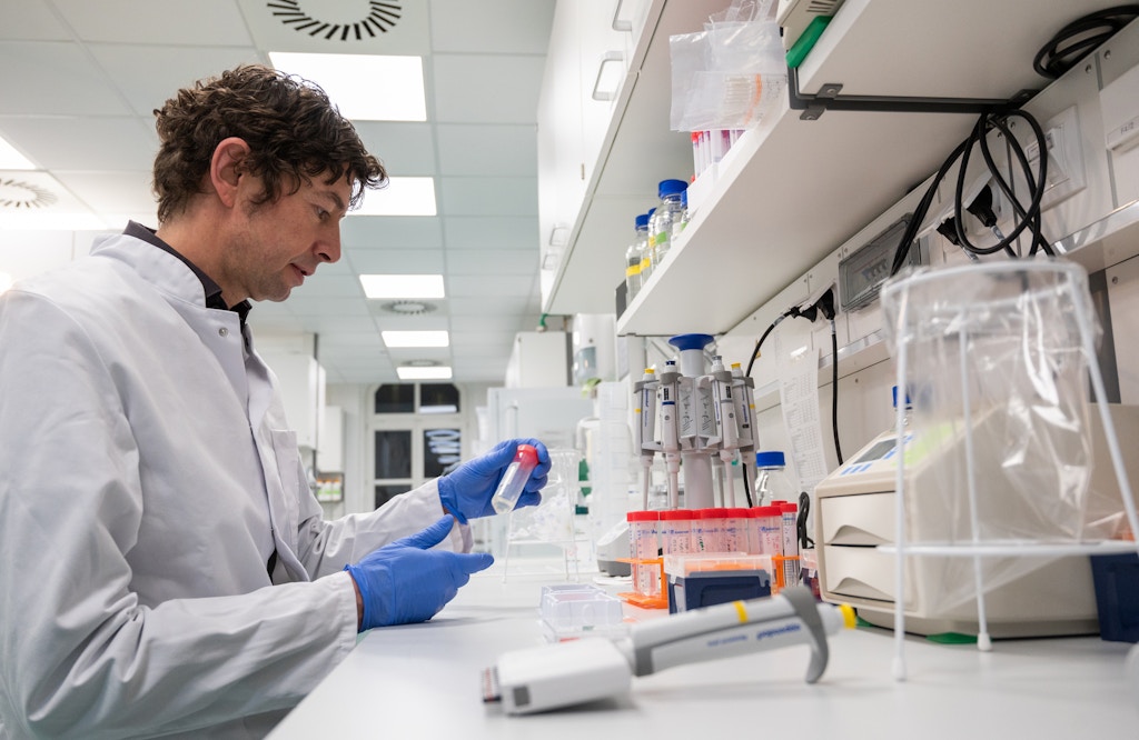 Christian Drosten, Director of the Institute of Virology at the Charité in Berlin, is looking at samples at the Institute of Virology, where research on the coronavirus is underway, 23 Jan., 2020, Berlin, Germany.