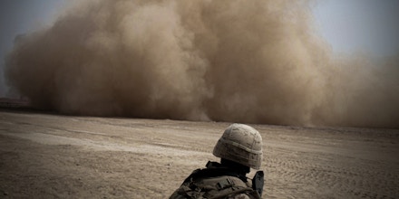 In this file photo taken on March 22, 2010 A US Marine V-22 Osprey tiltrotor aircraft spreads out dust while landing to pick up five arrested members of the Afghan police, after being caught smoking narcotics inside a US Marines base of 3rd Battalion, 6th Marines, in Marjah, Helmand province. - Launched in the wake of the September 11 attacks, the war in Afghanistan claimed the lives of tens of thousands of Afghans along with around 2,400 US soldiers and saw trillions squandered in what has largely been deemed a failed nation-building project. (Photo by MAURICIO LIMA / AFP) (Photo by MAURICIO LIMA/AFP via Getty Images)