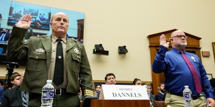 Mark Dannels, sheriff of Cochise County, Ariz., and Brandon Dunn, co-founder of Forever 15 Project, are sworn in during a hearing on U.S. southern border security in Washington, D.C., on Feb. 1, 2023. 