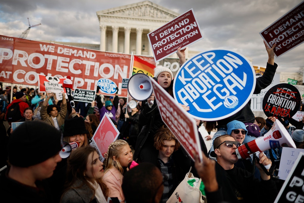Anti-abortion and abortion rights activists protest in front of the U.S. Supreme Court on January 20, 2023 in Washington, D.C..