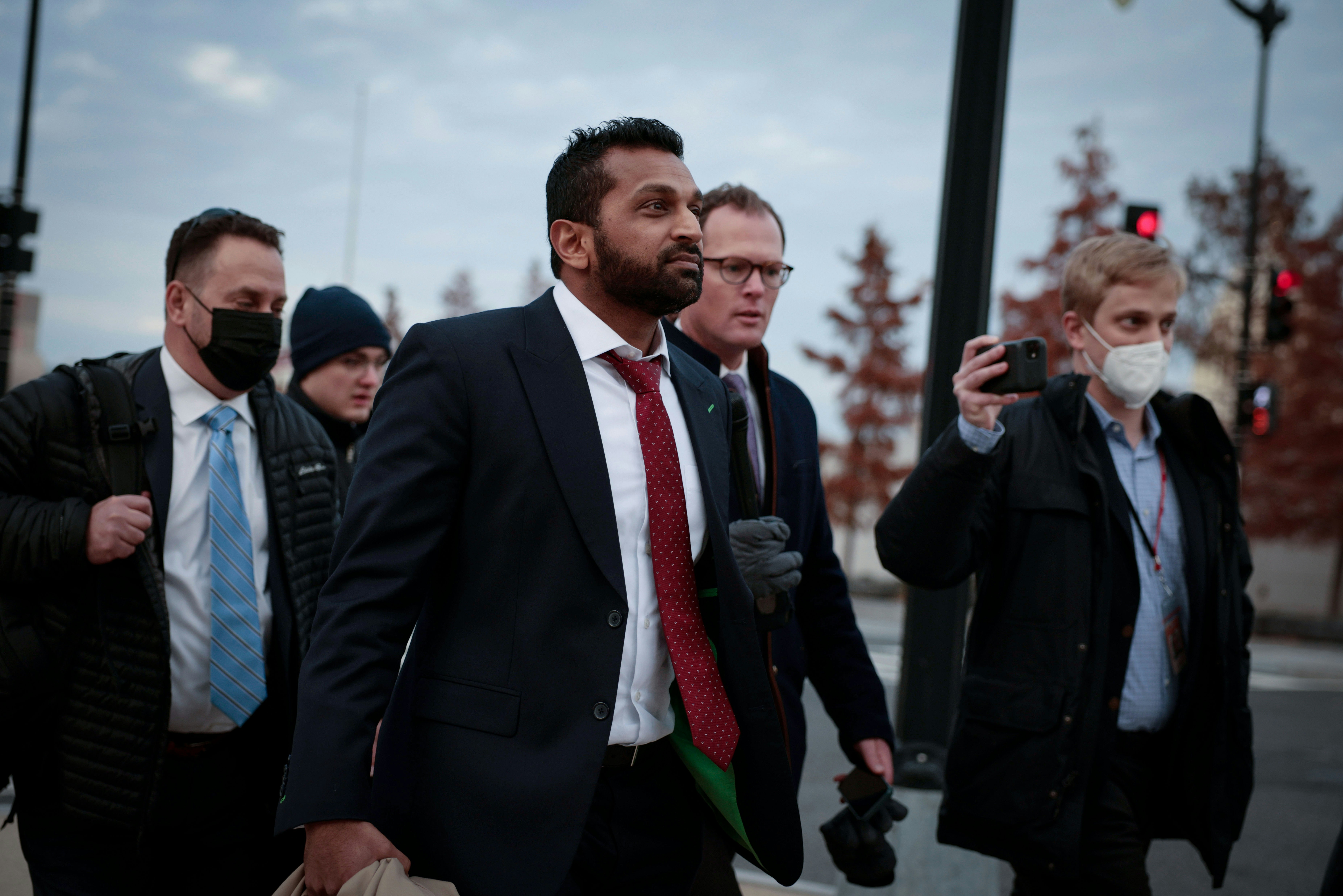 WASHINGTON, DC - DECEMBER 09: Kash Patel, a former chief of staff to then-acting Secretary of Defense Christopher Miller, is followed by reporters as he departs from a deposition meeting on Capitol Hill with the House select committee investigating the January 6th attack, on December 09, 2021 in Washington, DC. Members of the committee and staff members have been meeting with Patel and Stop the Steal organizer Ali Alexander, who both say they are cooperating with the committee investigation. (Photo by Anna Moneymaker/Getty Images)