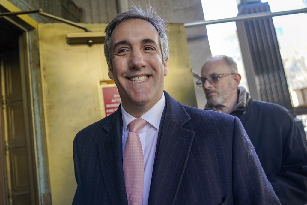 FILE - Donald Trump's former lawyer and fixer Michael Cohen smiles as he arrives for a second day of testimony before a grand jury on March 15, 2023, in New York. As Donald Trump fought his way to victory in the 2016 presidential campaign, key allies tried to smooth his bumpy path by paying off two women who had been thinking of going public with stories about extramarital encounters with the Republican. The payoffs, and the way the Trump's company accounted internally for one of them, are thought to be at the center of a grand jury investigation that could lead to the first ever criminal prosecution of a former U.S. president. (AP Photo/Mary Altaffer, File)