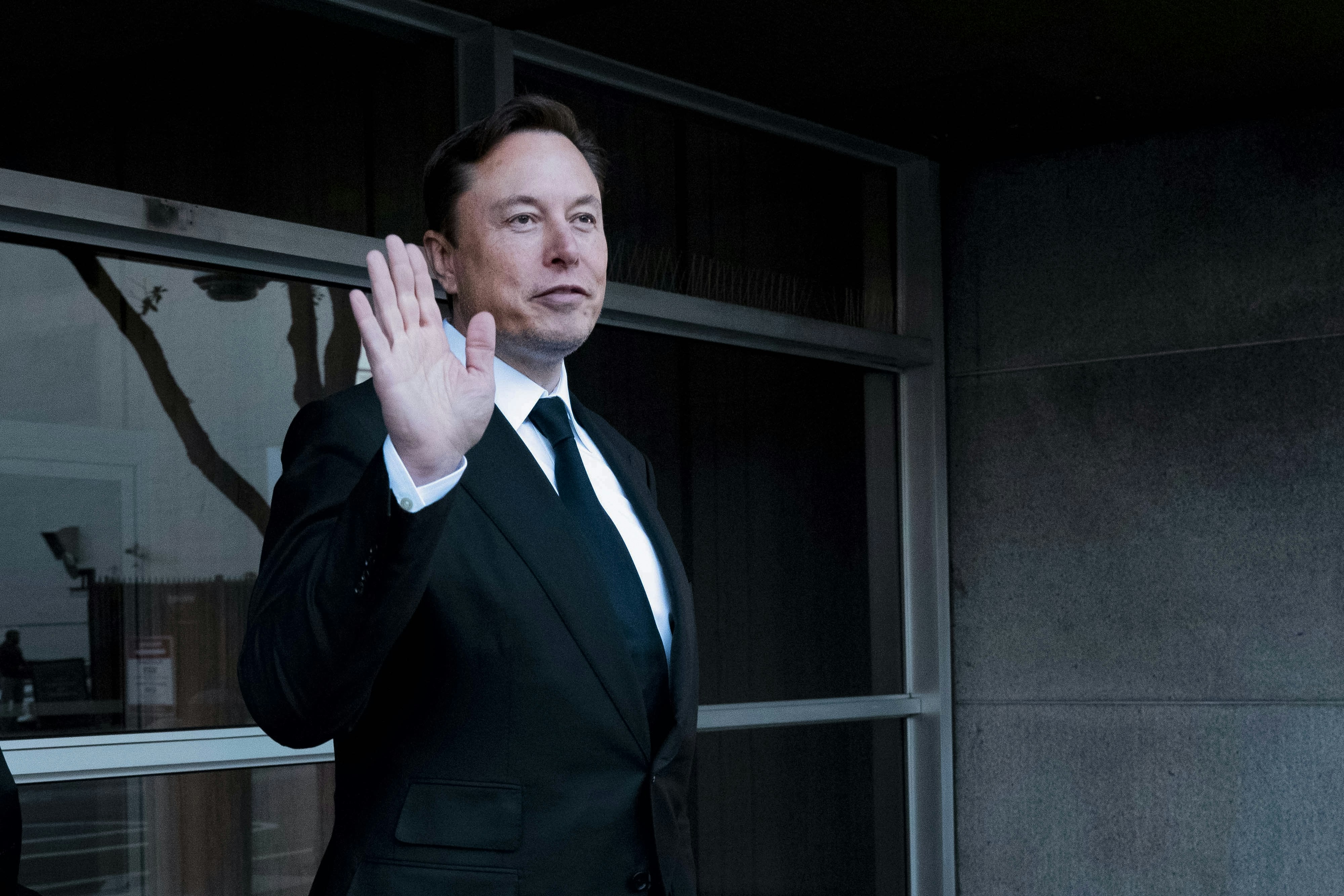 Elon Musk, chief executive officer of Tesla Inc., departs court in San Francisco, California, US, on Tuesday, Jan. 24, 2023. Investors suing Tesla and Musk argue that his August 2018 tweets about taking Tesla private with funding secured were indisputably false and cost them billions of dollars by spurring wild swings in Tesla's stock price. Photographer: Marlena Sloss/Bloomberg via Getty Images